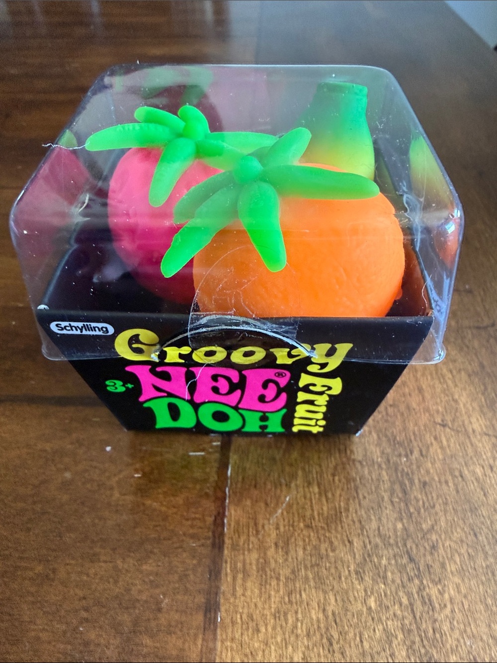 Schylling Groovy NeeDoh Fruit Stress Balls - Pink & Orange